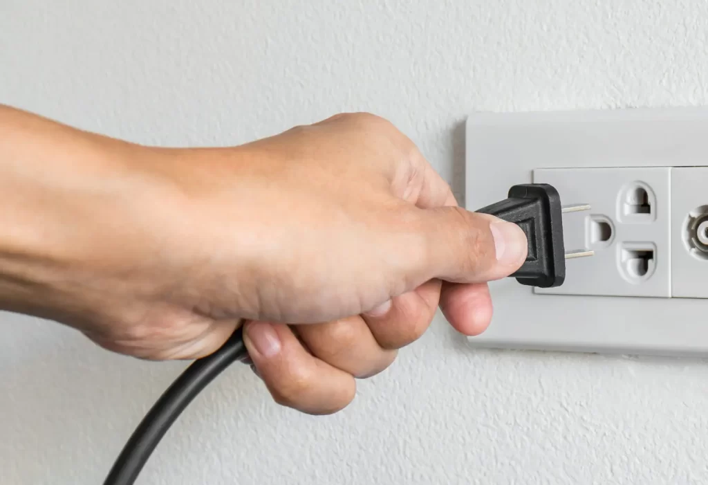 Unplug from power socket